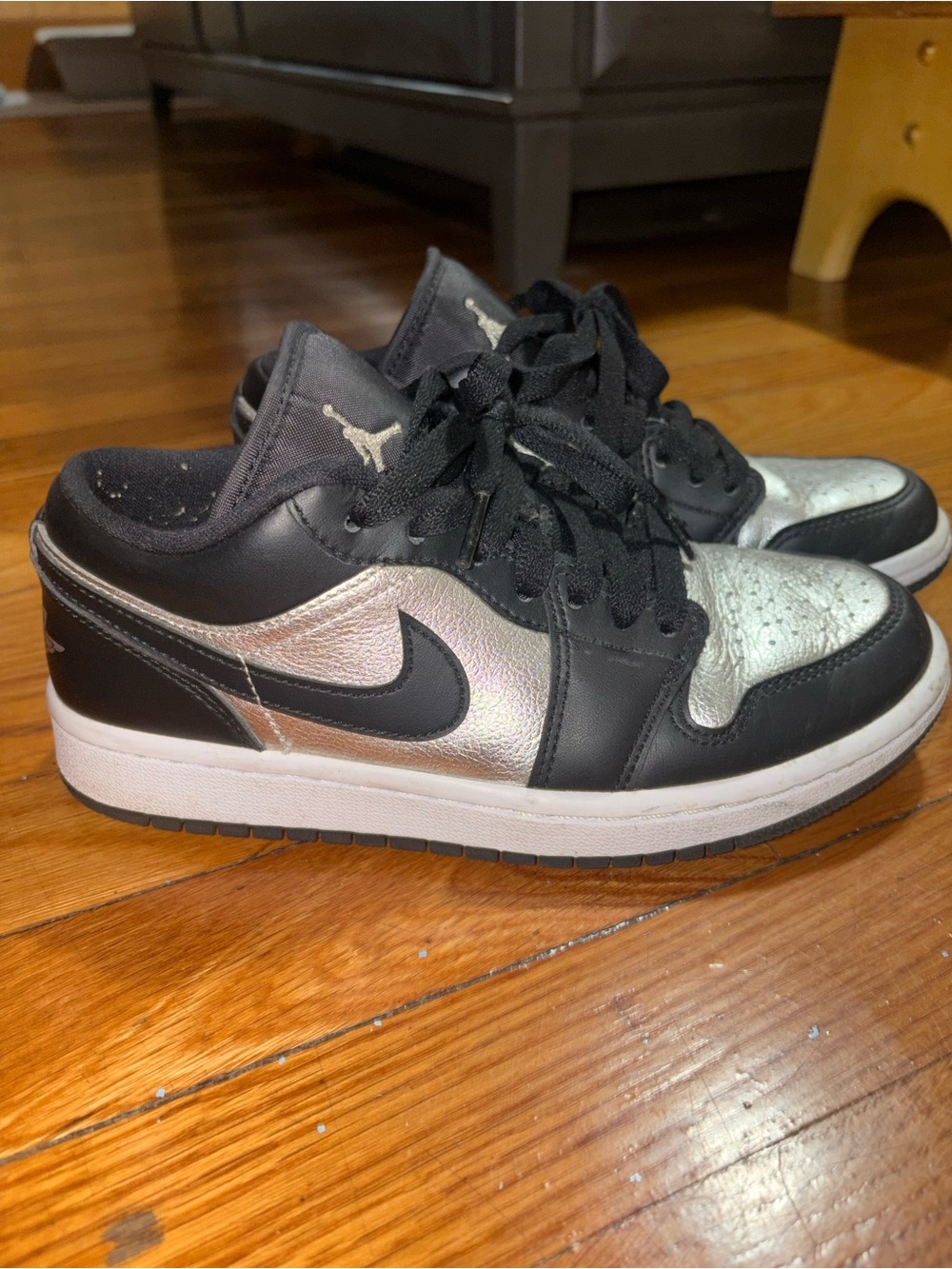 Nike Low-Top Sneakers in Black and Metallic Silver